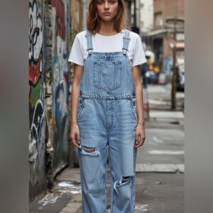 H&M Divided distressed denim overalls.